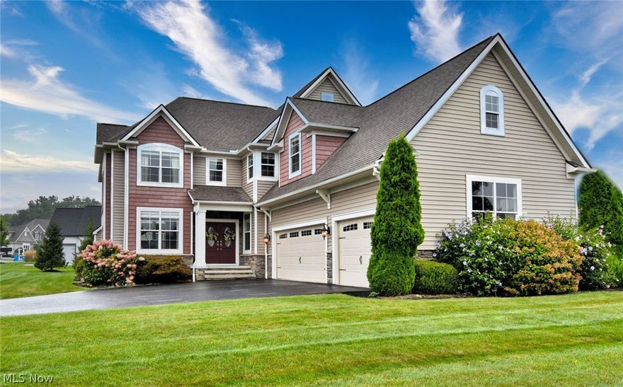 OWNER SAYS BRING OFFER! Custom Payne & Payne built and situated in the highly sought-after Canyon Lakes community in  Chagrin Falls. This exquisite 5-bedroom, 5-bathroom residence offers luxury living with exceptional craftsmanship and upscale finishes. Step into the large gourmet eat-in kitchen featuring rich wood flooring, striking granite countertops and granite covered center island with sink, two-tone cabinetry, stainless steel appliances, and a beverage refrigerator. Designed for effortless entertaining, the kitchen flows seamlessly into the 2 story great room, where soaring ceilings, floor-to-ceiling windows, a cozy gas fireplace, and hardwood floors create a warm, sophisticated atmosphere. The main level also offers a formal living and dining room with crown molding and extensive millwork, a private office with built-in cabinetry, and a well-appointed mudroom and first floor laundry for everyday convenience. Upstairs, retreat to the luxurious owner’s suite complete with its own fireplace, a private sitting room with dry bar, and a spa-like ensuite bath boasting a clawfoot tub, dual sink vanity, a walk-in shower, and two spacious walk-in closets. Three additional spacious bedrooms and two full baths and a versatile loft complete the upper level. The partially finished lower level, 13 course basement, offers even more living space with a play area for kids, private bedroom and full bath—perfect for guests, in-laws, or a home gym with ample unfinished storage space. Don’t miss your opportunity to own this extraordinary home in one of the area’s most prestigious neighborhoods. Schedule a showing today and make this  beauty your own. Walking distance to River Road Park behind this neighborhood where you will find soccer and baseball fields, indoor and outdoor grilling and walking  trails with magnificent views of the iconic red barn and horses grazing. Fantastic playground. Motivated Seller!  AWARD  WINNING SCHOOLS, minutes to Chagrin Falls!  BRING  OFFER!