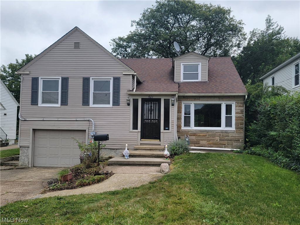 Come and see this unique multi level home with 1 car attached garage. Enjoy the fenced in back yard on your 2 tiered deck while cooking out or just enjoying the shade tree. The bedrooms have hardwood floors and nice closet spaces. All the appliances stay in the eat-in kitchen that has a cool retro look. There is a fireplace and bar in the basement (seller has never used fireplace). The water tank is brand new and the furnace has been serviced every season.