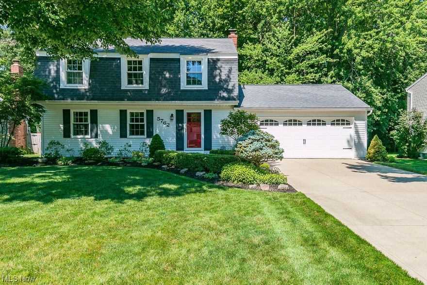 Welcome to this beautifully updated 4 bedroom 2.5 bath colonial.  The grand living room has so much natural light open to the dining area. The completely updated kitchen has so much counterspace and an island! The family room is so cozy with a gas fireplace!   The master suit is the perfect place to retreat too! Three more bedrooms are spacious and the closets are huge!  The basement has nature stone, great for working out and storage!  Walk out to the patio and enjoy the serine backyard. Its trees are breathtaking. Nothing to do but move right in!