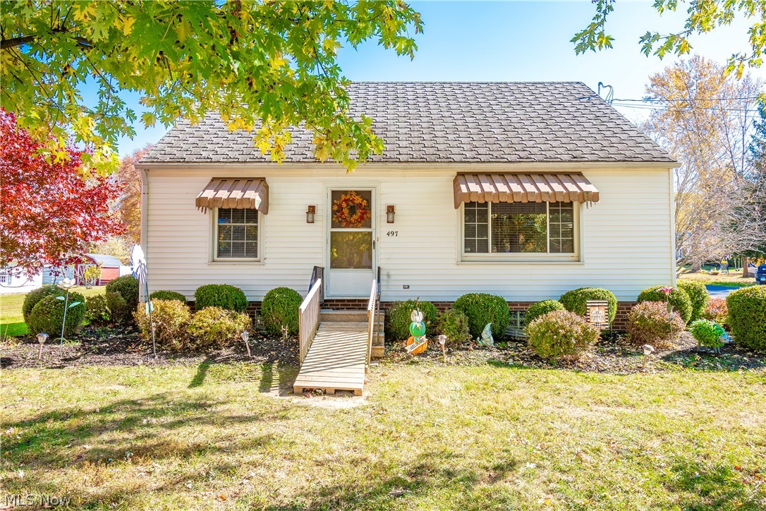 Welcome home to 497 Gates Street! Sitting on nearly a half acre corner lot, this cozy bungalow boasts 3 bedrooms, 1.5 bathrooms, a beautiful private patio and more! Enter into your large living room with hardwood floors (2017) and continue into the kitchen offering a breakfast area. Also conveniently located on the main level are two great sized bedrooms with newer carpet along with a full bath. Venture upstairs to find your owner's bedroom with a walk-in closet and large hallway that can be used as a reading nook. The basement features a laundry area, half bath, and a spare room. Sitting off of your 2 car garage is the back patio offering a partial fence and additional trees for privacy, perfect for entertaining. There is also a shed at the end of the lot for storage. Don't miss your opportunity to own this home. Schedule your private viewing today!