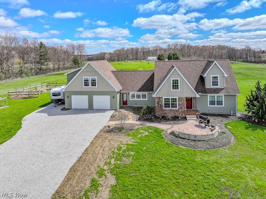 Beautiful 4 BR, 3.5 Bath Cape with tons of character surrounded by 15 acres of fenced pastures and open land. Very nice 4+ stall horse barn, large pole bldg, chicken coop and much more. The home features a great eat-in Kit with custom cabs, granite counters, tile backsplash, corner farm sink, island with dining counter, stainless appliance and more.  The Kit is open to the Living Rm and has a large opening to the recently added Family Rm. The Family Room, with cathedral ceilings has beautiful heated tile floors, a gas fireplace, ceiling fan and a wall of built-in cabinets. The 1st floor Primary Suite features wood floors, custom book shelves, walk-in closet and a private Bathroom with custom tile shower, dual sink vanity and tile floor. The Laundry Rm and Powder Rm complete the 1st floor.  Take the main stairway to the 2nd floor with 2 large bedrooms, a full Bathroom and a large storage closet.  You will love entertaining in the finished Lower Level Recreation Room which is open to the Bar Room. Shoot some pool, throw some darts and enjoy a cold one from the privacy of your own home! There is also a spacious Work Out Room. The recently added attached 2-car Garage has 2 heated dog kennels and a roughed-in dog wash station at the rear of the Garage.  A stairway leads to a huge vaulted teen/guest suite complete with a private Bathroom.  This could also make a perfect home office/homeschool suite.  The 40'x48' barn features 4 stalls (3 have access to the covered run-in and front pasture), additional room for more stalls at the back of the barn, a large tack room with running water and a 2nd floor hay loft.  The 70'x40' workshop has a large open area and a separate wood shop at the rear and a large workout/training room.  Bring your horses, chickens and other farm animals and move right in to this turnkey agricultural property.  Located in the award winning Kenston School District. Dining, breweries & LaDue Reservoir nearby!  35 min to Cleveland or Hopkins