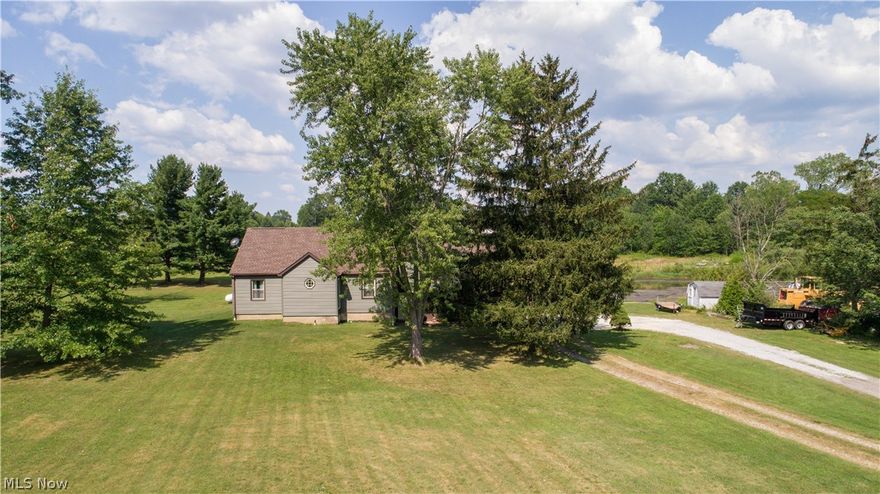 Country Living at its Finest!  This spacious home offers over 2500 sq.ft. of living space and privacy galore on 3.84 Acres!  Enjoy 3 seasons outside on your expansive deck, which overlooks beautiful trees, fields, and a pond.  Have fun on family movie/game night or spend some alone time reading a book in the open & beautiful recreation room which features laminate flooring & new, double pained thermal windows with transferable warranty.  The open eat-in kitchen allows you to prepare snacks & meals while enjoying views of the expansive property outside.  The formal dining room off kitchen allows for easy & convenient entertaining.  Spacious front room is the perfect place to relax & unwind.  Downstairs also boasts a full bath with walk-in shower & master bedroom with gorgeous views of the property.  Upstairs has beautiful wood flooring & 3 bedrooms, as well as a 2nd full bath with tub.  Full, unfinished basement has storage galore, and a walk-out to the 2 car garage!  This home features