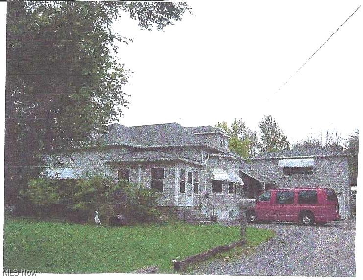 This property is currently used as residential with an attached apartment. There are a total of three parcels containing 16.1 acres. Frontage on Root Rd. All mineral rights are owned by the seller. Gas and water wells on the property as well as a large holding pond and a French drain at the rear of the property routing water to the proper area. Located close to Lake Erie, across from the new racing car facility being built. Close to I-90. Good location for Hotel/restaurant complex with room for boutique shops and/or recreational sites. A huge opportunity to get in on the ground floor of an up-and-coming developing area.
The value is in the land itself and the house and apartment are just a bonus. Property is wooded and additional land may be available.