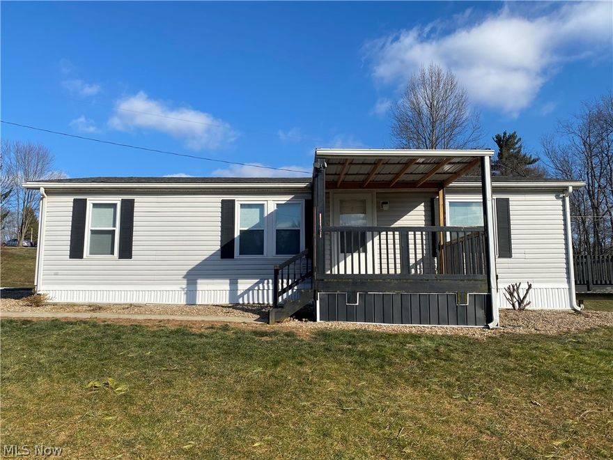 Here is a unique opportunity for peaceful living and multiple options! Just outside the city limits, this 3 bedroom, 2 bath home sits on a private lot, in a privately developed neighborhood. The home has new carpet through out and is currently having one of the bathrooms remodeled. Another potential perk is that the lot is set up to allow another home placed on it, including separate utilities possible and a separate address (510 S. Pleasant Grove Circle). This parcel could be used as-is for private residence, or put in the second home to share with extended family or investment purposes. 

Close to Route 40 with access to I-70, makes commute to various surrounding area quick and easy.