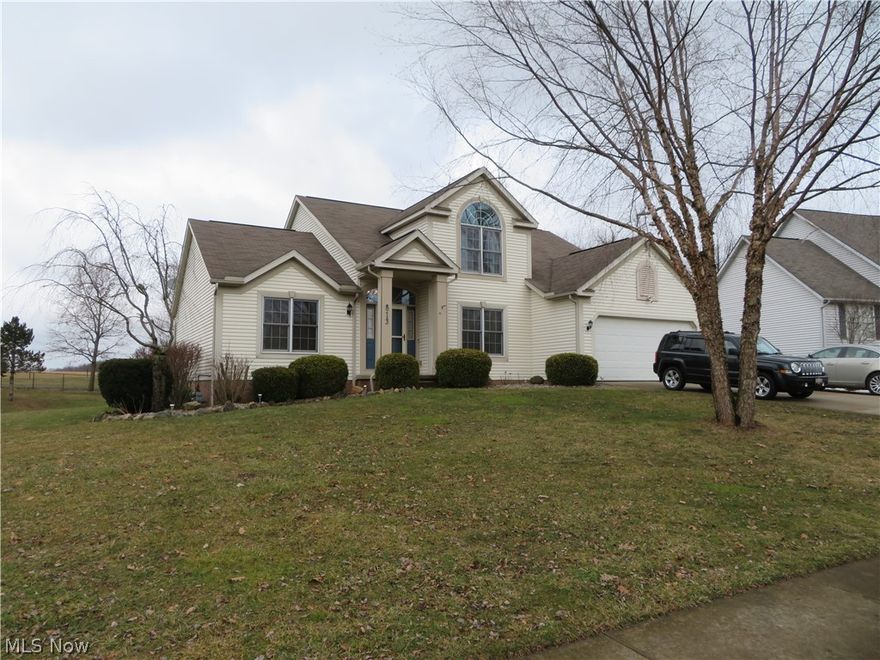 Welcome to your new home on an extra-large lot with an open concept and 2 story foyer. This lovely home features a 1st floor master suite with large bath, open living area the living area features a stone gas fireplace, open to the kitchen a dining area, formal dining room that could be used for an office and first floor laundry. The second story features 2 beds and a full bath and a bonus area that could be finished into a 4th bed if needed. The basement is partially finished with a water softener. From the dining area you can go and enjoy your outdoor oasis with and oversized deck that features a tiki bar that has electric. There is a barn to the back of the lot and John Deere lawn tractor will convey. Possession June 1st.