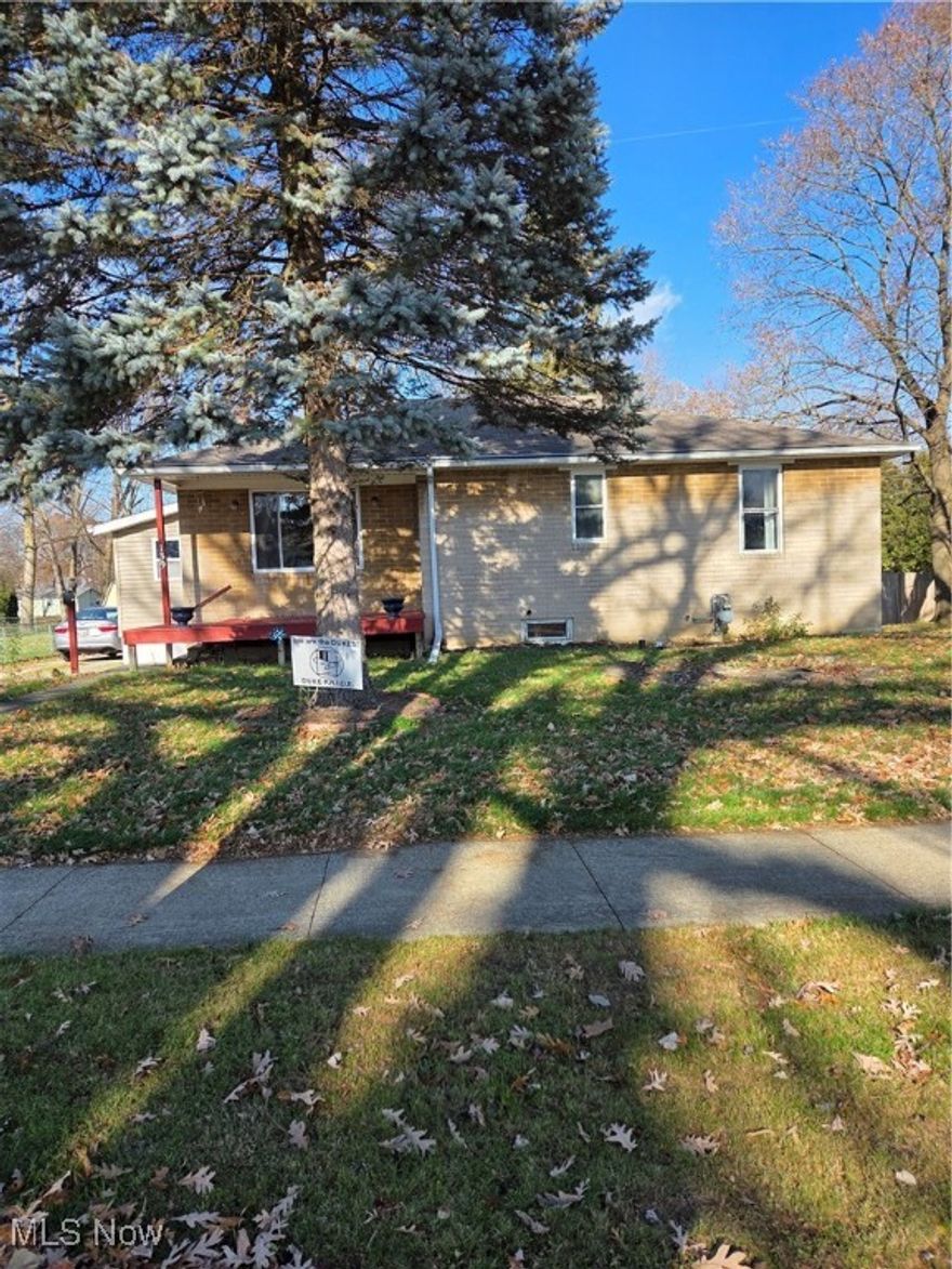 This 3 bedroom, 2 full bath Brick Ranch with a full basement, 3 car garage and a large back yard is waiting for you!
Home needs some TLC - bring your imagination to make it your own!  All the bedrooms need paint and flooring.  The Kitchen and Living Room can use some polishing up too.  The living room and kitchen are good size - great for entertaining. The full bath on the main level has been remodeled, featuring ceramic tile floor and a lovely ceramic tiled walk in shower.  The basement includes an additional kitchen, rec room and a full bath with a walk in shower.  The back door entrance has an extra wide stairway with a 4 x 4 landing great for storing shoes, boots and coats.  There is a cozy front porch and a large back deck both for enjoying warmer outdoor evenings.

The 3 car garage was added in 2008/2009 and has a drainage system in the front of the building as well as a drain on the inside.  There is electric and water too.  The larger garger door doesn't work-needs repair.  The smaller garage door opens manually.

There is a sump pump located outside - back east corner of the home.

This home has so much potential.  Priced to sell.  Schedule your showing today.