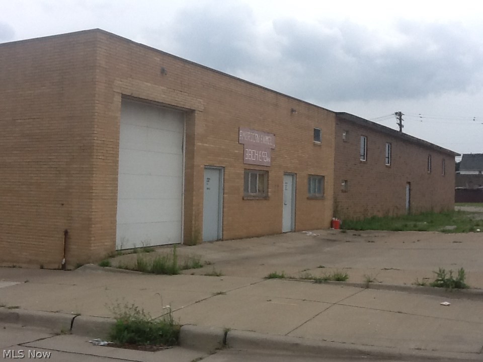 This building is a must see!!!
Light manufacturing/warehouse building for sale in a high traffic area located on the east side of Cleveland.
The original building offers 4000 plus sq ft with office space, restroom, and overhead door.
The addition, added in 2000, brings an additional 8000 plus sq ft with office space, restroom, high ceilings, steel beams, 2 overhead doors, and many other features including a loft on the second level.
(The adjacent lot to the building is owned by the city, not included with the sale of the property)