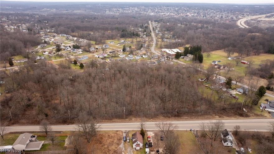 6.63 Acres - Currently Zoned Residential with Commercial Potential. Great Opportunity to own 6.63 Wooded Acres in a high visibility area near Major Highways and Established Commercial Area. Currently zoned Residential with the Potential  (Buyer to Verify) to a commercial zoning Change. Must Verify with the City. Could be Multi-family property or more. The Property was Inherited and the Seller has limited knowledge of the land with the exception of not having any mineral rights to transfer. Utilities are available at the street with the required permits and costs involved to add then to the property. This is a Great Property for Investors, Developers, or Buyer's looking to build with future commercial possibilities.