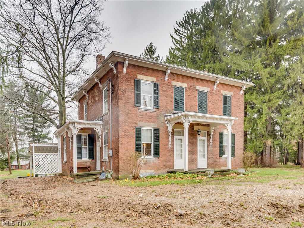Charming Georgian brick colonial built 1845 on 2.92 acres in City of Green having 4 bedrooms, 1.5 bath is like stepping back in time* Spacious 2244SF with high ceilings, wood floors, transom windows above the doors, deep windows sills & original woodwork in most rooms* Updates include furnace & central air (approx. 10 years), shingles, downspouts & gutter guard (approx. 6 years), front porch & side rubber roof (2016), connected to city sewer (2016)* Wood burning fireplace in living room* Dining room with built in corner china cabinet* Office with built in book shelves and access to family room* Eat in kitchen with black and white checker floor & some original cabinets* Spacious 1st floor half bath* Poultry building 1910* Detached garage originally used to build boats and can accommodate 2-3 cars* A vintage rare find loaded with character!