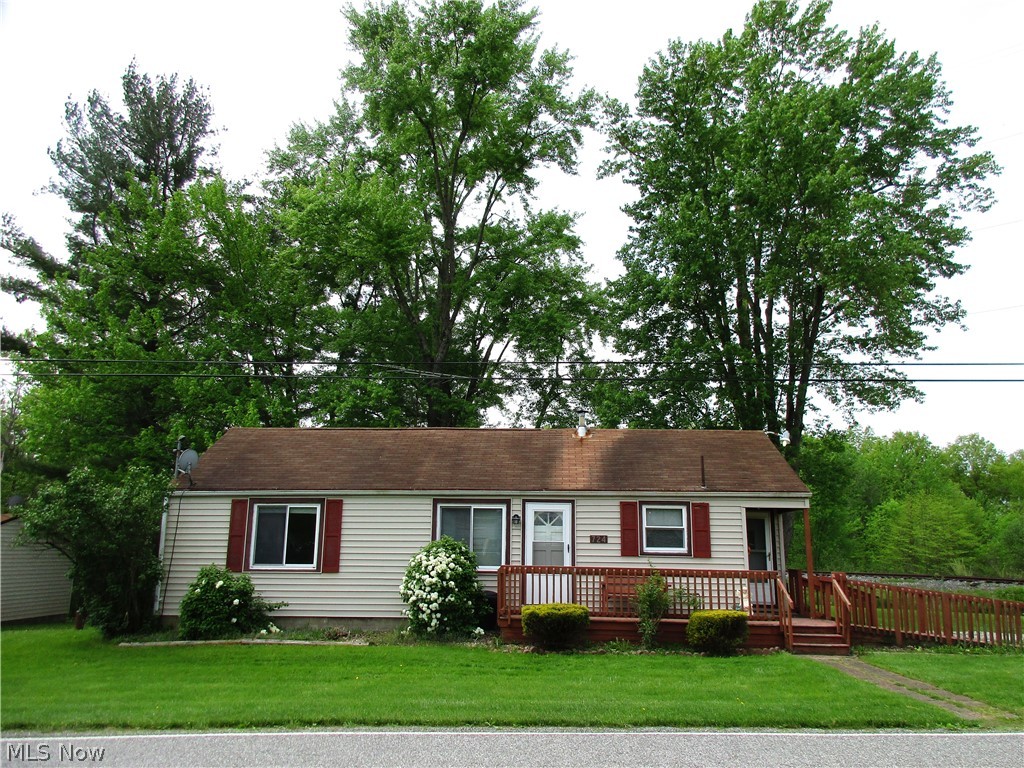 Ranch home on approx 3 acres! See the 3 BR home w/updated Bath, familyroom w/fireplace. Kitchen w/appliances. Full walk out Basement. 2-car DT garage. City water. Home Warranty Included!