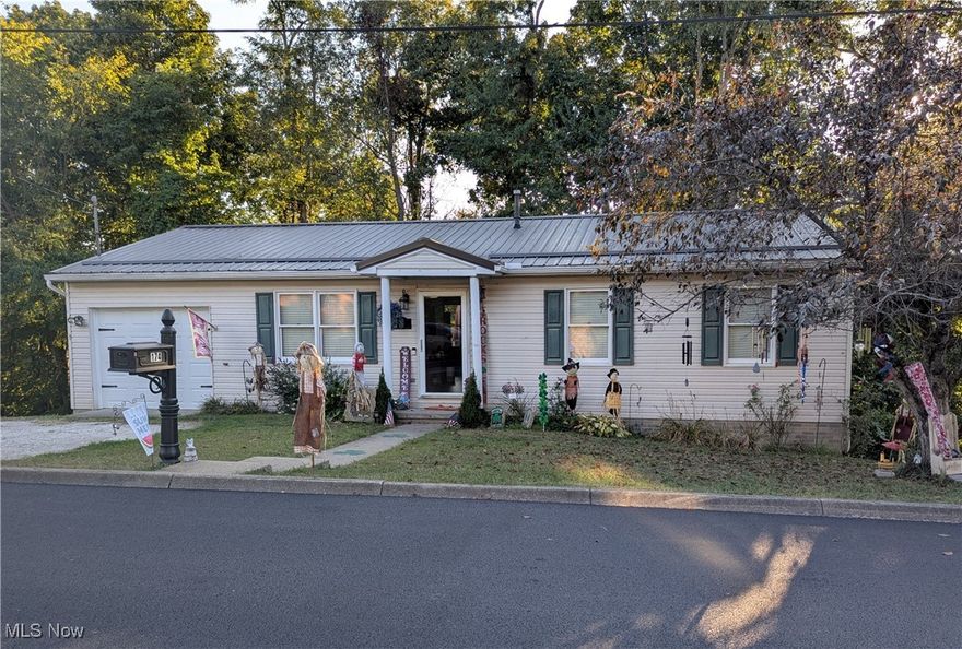 This charming Ranch Style home sits towards the end of Pine Ln. This Home Features a nice Living Room, Eat in kitchen, Attached Garage, 3 Bedrooms and 1.5 baths on the main floor, with walk out access to the back deck. 4th Bedroom is finished and in the basement. Many expensive upgrades have already been completed for new homeowners! Upgrades include: New Garage Door and opener installed in 2023 (you can also Bluetooth your phone to it as well). New Central AC Unit and New Gas Furnace installed in 2023. New Back Deck was built in 2023 as well as new flooring installed. New Metal Roof, new leaf guard gutters, and new downspouts were installed in 2020. All these upgrades were completed by Professional Companies. Sellers are currently occupying the property and are starting to pack their belongings. All appliances and exterior grill on back deck stays if desired. Deep freeze in basement stays. Deep freeze in Garage, does not stay. Come Tour your New Home today!