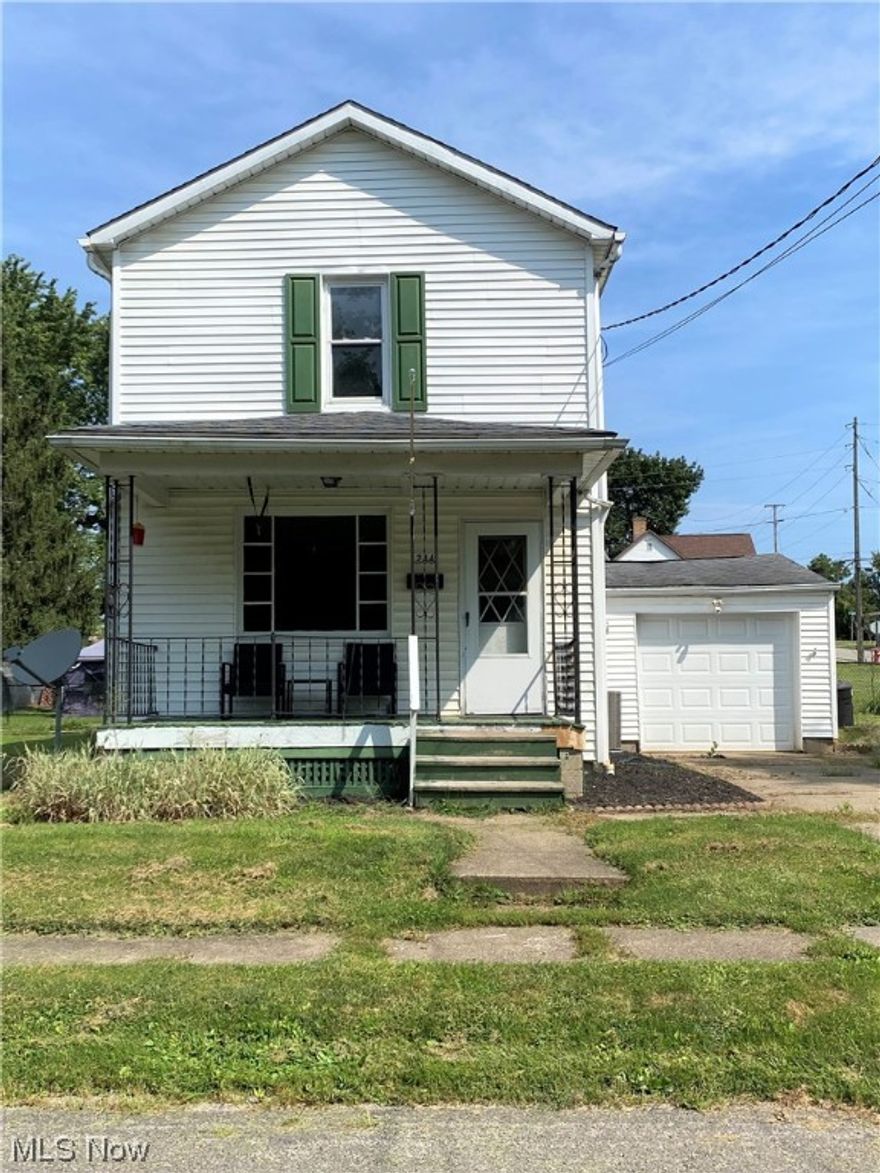 East Palestine - Two bedroom, 2 bath corner lot within walking distance to East Palestine park, shopping area and schools.  The living room is spacious enough that if needed, with furniture placement it could easily be made into both a living room and dining room. The galley style kitchen offers a beautiful backsplash, stainless refrigerator, countertop microwave, electric stove, a dishwasher and a rear door leading to a rear patio. Off the patio is a man door that provides access the garage. The second floor boasts two bedrooms, a captive bonus room and the second floor bath. The bathroom offers ceramic tile walls and flooring. The captive 8 x 12 bonus room could serve as a third bedroom, a nursery or an office. Both bedrooms and the bonus room have double closets and the hallway offers additional built-in storage. You will be pleased to see that all of the original exposed flooring including the staircase, is wood! You may want to change the floor stain and wall colors before you mov