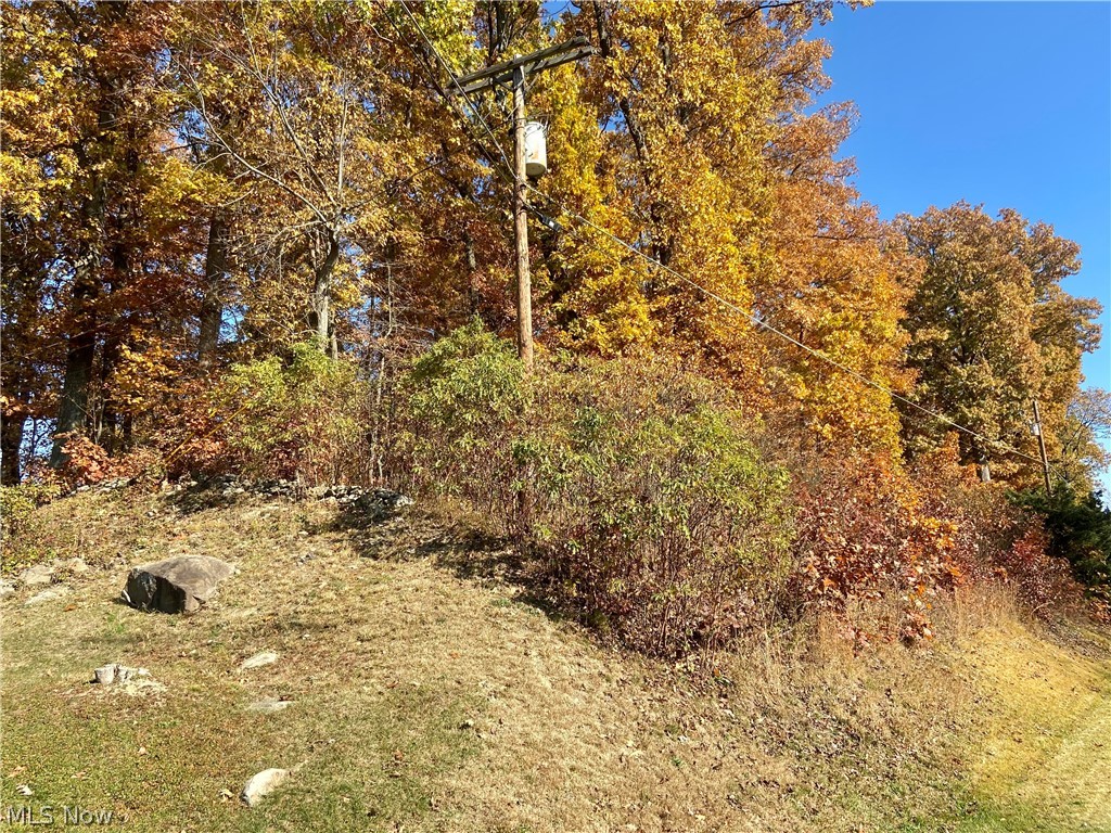 Great building lot in a good location, near the front gate, golf course, marina and main beach. Levels out with a potential of a beautiful seasonal lake view. Lake Mohawk is a private gated community consisting of a 500 acre lake with unlimited horse power, 9 hole golf course, 3 beaches and tennis courts. Build your dream home or just buy a piece of property for lake access.