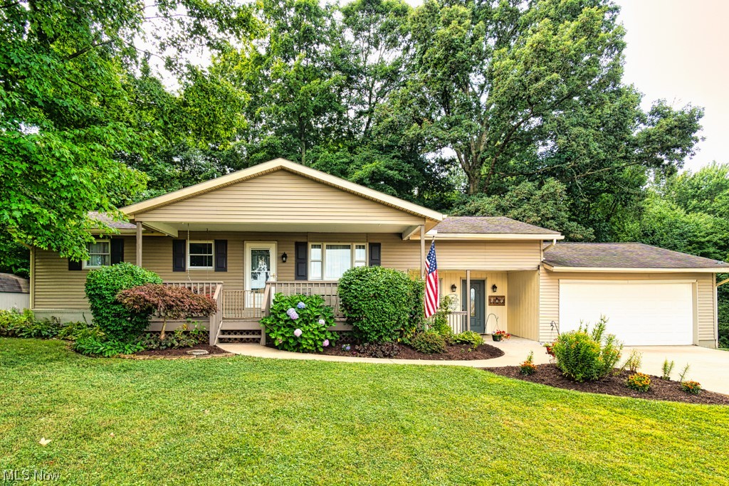 Great country living in this wonderful 4 bedroom ranch home on 2 acres! Beautiful hickory cabinets in the eat-in kitchen with an island and lots of counter space. Most of the kitchen appliances are new within the last 5 years. Solid wood doors throughout the home and many closets. Part of the yard is fenced in with a privacy fence to enjoy the backyard and front porch to enjoy the peacefulness in the front. Concrete driveway and stamped concrete as you enter the home. Huge mud room with tons of space between house and attached 2 car garage which includes a 220 outlet for an air compressor etc. Heat pump for heat and A/C new in 2017, Gordan Brothers Water softener with reverse osmosis new in 2015. Anderson windows throughout. Shed to offer even more storage. All electric home, per Ohio Edison the average bill is $167!