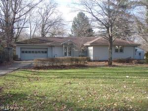 awesome over 1700 square foot ranch in Boardman schools. 3 bedroom full basement and attached garage are just a few amenities in this freshly painted , fresh carpet home, must see this one, almost an acre! This is a Fannie Mae Homepath Property