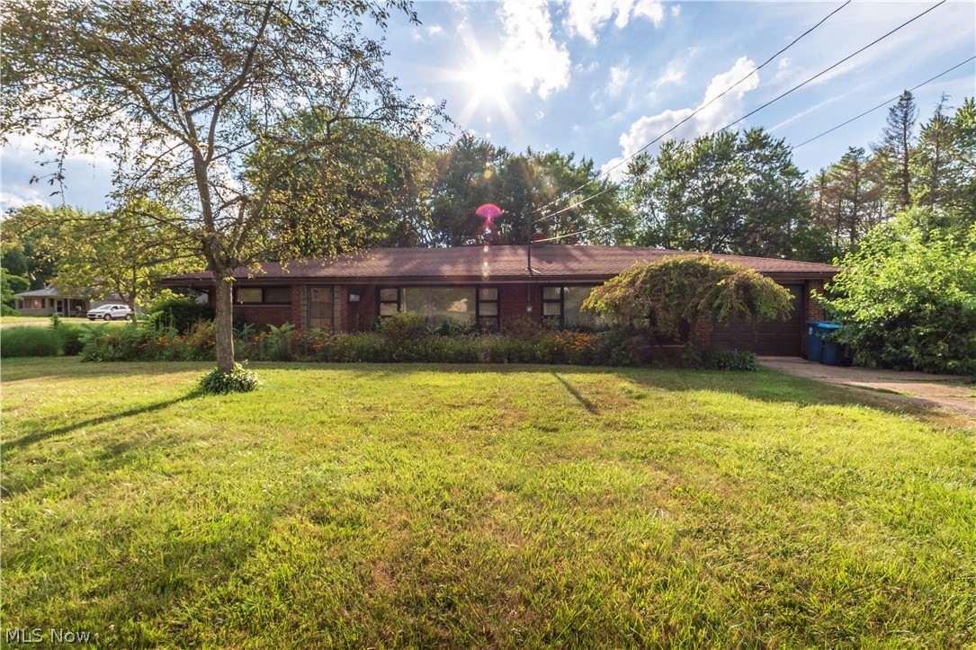 Check out this beautiful Ranch sitting on 2.87 acres! This home offers a spacious three bedrooms and one full bathroom , spanning 1,440sqft with a full basement! Spacious living room with a picture window, offers a lot of natural light! A must see property on beautiful lot! This won't last long, don't miss out!