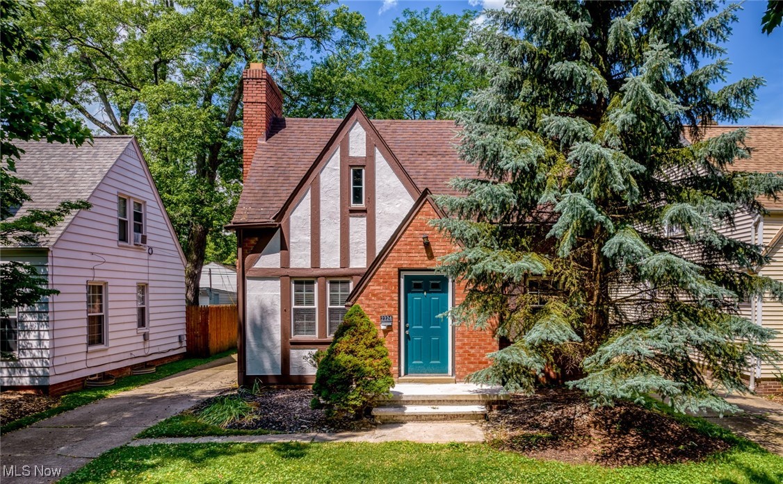 Welcome to this truly special 3-bedroom, 2-full-bath Cape Cod-style Tudor bungalow, perfectly situated on a peaceful side street in one of the city's most walkable and desirable neighborhoods. Step inside and be greeted by a warm, inviting living room anchored by a handsome fireplace and glowing hardwood floors that stretch throughout the main level. The kitchen has been renovated in 2025 with new cabinets, granite countertop and stainless steel appliances. The spacious layout includes two generously sized bedrooms and a meticulously preserved full tiled bath on the first floor—ideal for guests, family members, or a convenient work-from-home setup. Upstairs, discover a private bedroom retreat with its own renovated full bath(2025), creating a cozy and quiet sanctuary. Downstairs, the finished basement offers a fully waterproofed rec room wrapped in rich, classic knotty pine—perfect for a home theater, game night, or a quiet reading nook. The basement also includes ample storage space and laundry area, rounding out the home’s functional appeal. Enjoy morning coffee or lazy summer evenings in the screened-in porch overlooking the serene backyard. Whether you’re entertaining or just relaxing, the outdoor space is a natural extension of the home’s cozy interior. Located on a quiet street, yet just steps from parks, schools, local shops, and cafes, this home offers the best of both worlds: tranquil living with the convenience of a vibrant community. Whether you're searching for a forever home or a beautifully maintained house with historic soul and modern touches, this dreamy Tudor Cape Cod is a true standout. Schedule your private tour today and fall in love with every detail.