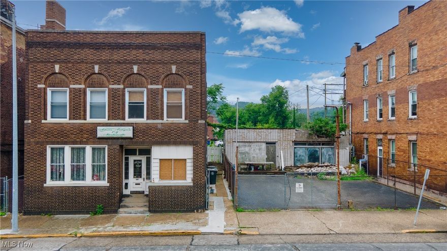 Don’t miss this fully occupied commercial apartment building, perfectly located just 6 minutes from Franciscan University and 8 minutes from Weirton. This income-producing property includes four rental units: Unit 1 is a one-bedroom, one-bath apartment currently rented for $900/month, while Units 2, 3, and 4 are each rented at $1,200/month and feature three bedrooms, one bathroom, and a kitchen. A private parking lot to the right of the building is included in the sale and currently generates additional income, with tenants paying $100 per month for parking. The basement offers excellent potential for future development, with generous storage space, an unfinished half bath, and a layout that once housed an antique store—ideal for conversion into retail or additional rental space. The property also includes a shed in the backyard, which will remain with the sale. Recent updates include new water heaters, new furnace, and windows.