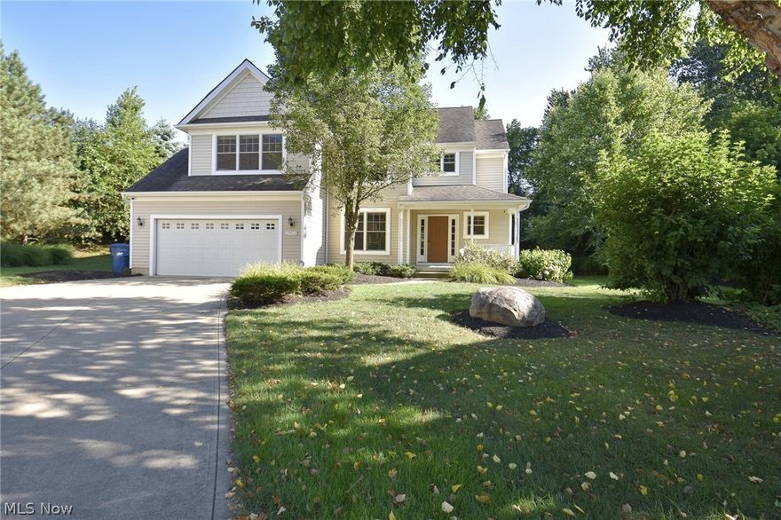 If you are looking for a Totally upgraded stunning home this one is for you! This Brady built home features a large kitchen with hardwood floors, granite counters, stainless steel appliances and large morning room. The morning room leads out to a stunning backyard that features a stamped concrete patio, custom grill surround with granite with custom stone, a bar, hot tub and play set . The finishing touch is a roof overhang that is perfect for entertaining even when the weather isn't cooperating with your entertaining plans! The custom finished basement which comes with TV has a half bath with a wet bar along with a workout room or office. all surfaces in bathrooms have granite counters. The large master suite features a gas fireplace and custom closet organizers with a ton of storage space. The others three bedrooms are nice size and all have closet organizers. Over $100,000 has been put into the home since its been built!! Don't miss the opportunity before this truly custom home with