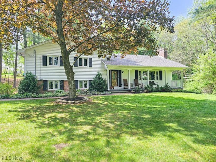 Take a deep breath - and let it out slowly, allowing all the worries of  the day to just slip away!  That's how you feel as you pull into this driveway.  Driving up the black top driveway to your attached double car garage will just transform your mood into peaceful and easy living! Walking to the front door is a lazy afternoon relaxing covered porch where you will be sipping your many glasses of ice tea.  Kicking those shoes off in your front foyer you are welcomed into a huge living room with book cases full of your favorite books and a fireplace to warm those chilly nights.  Continuing through to your formal dining room which welcomes many family conversations around those special meals for every season.  The kitchen is busy and cozy as a central room of the house.  Upstairs is a HUGE master bedroom, a smaller bedroom, and your main full bathroom.  The basement encompasses a huge room that could be your 3rd bedroom, your office, workout room, craft room, or your family room that pulls everyone together for games, movies, and precious memories. As well as ANOTHER full bathroom!  The other side of the basement provides your laundry area as well as extra room for a miniature workshop.  Don't be alarmed if you see goats, chickens, and other wild creatures roaming around, these 6 plus acres has been filled with every pleasure of hobby farming.  As well as the additional 20 x 20 cement block, cement floor out building. Brick walkways and casement windows is the added charm to this home. The well & septic have passed their recent inspection with documentation in the supplements.  So there you have it folks!  Give me a call and let me show you your dreams come true!!!  Furnace is inspected yearly with some recent updates.  New hot water tank in 2023.  New clothes dryer in 2022.  Water softener updated in 2024. 2019 new paint and flooring.   Move in ready!!