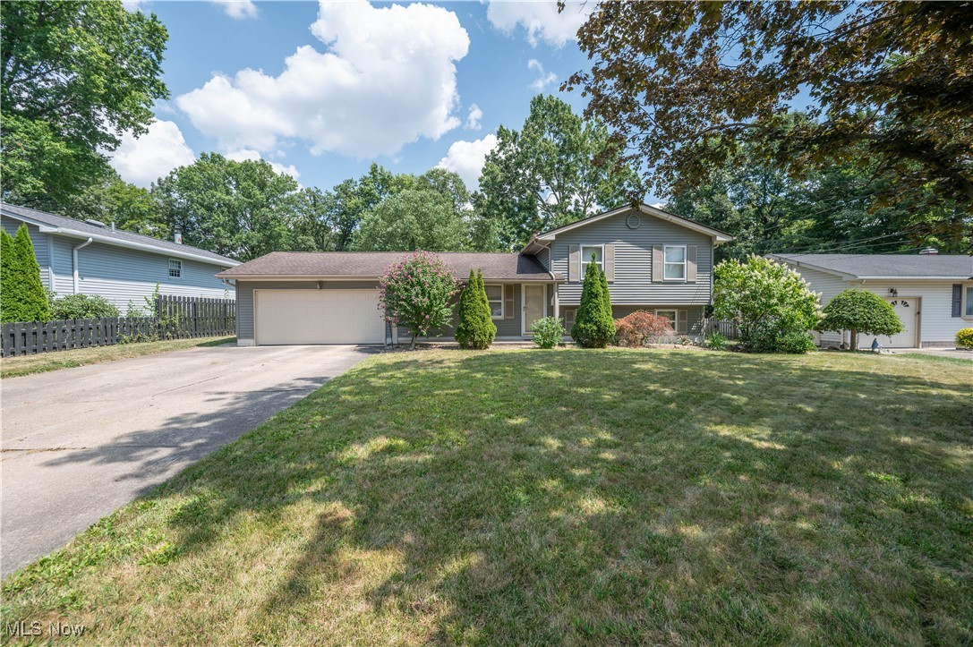 Welcome to 2211 Penny Lane! This 3-bedroom, 1.5-bath split-level offers nearly 1,500 sq. ft. of inviting living space in a highly desirable neighborhood. The main level features a bright, open living room that flows into an eat-in kitchen, while the lower level adds a spacious family room, half bath, and laundry area — giving you plenty of room to relax and entertain. Upstairs, you’ll find three comfortable bedrooms and a full bath. Step outside to a private, fenced backyard complete with an in-ground pool, large deck, and covered front porch — perfect for both quiet evenings and outdoor gatherings. Additional highlights include an attached 2-car garage, oversized concrete driveway, and central air. Conveniently located near shopping, dining, and parks, this home combines comfort, functionality, and an excellent location. Don’t miss your chance to make it yours — schedule a showing today!