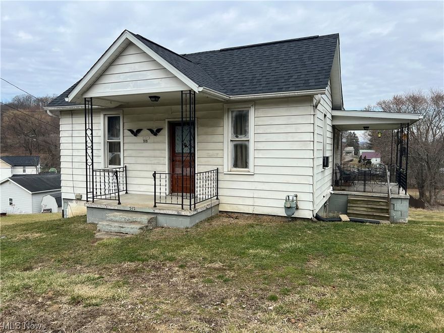 Welcome to this spacious property boasting 4 lots and many updates completed in 2023, including a new roof,  countertops, flooring, kitchen sink, plumbing, shower/tub, and gas furnace. With city water and sewer, this property offers convenience and potential with four lots, three detached garages, and picturesque views of the town and courthouse. These new additions provide a solid foundation for further customization. Whether you're a car enthusiast or seeking rental income, this property offers versatility and opportunity. Cash or conventional financing is preferred. Property is being sold AS IS. Schedule a showing to explore the potential of this property today!