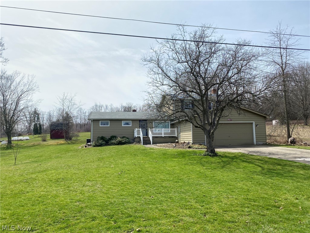 Beautiful country setting! Approximately 2000 sq ft of living space! This 5 bdrm home feature 3 bdrms on main floor, eat in kitchen with ceramic countertops and ceramic flooring, formal Living rm (currently used as dining rm)with hardwood flooring plus full bath. Hardwood flooring under carpets on main floor. The addition was added in the 80’s and features family rm off kitchen with 2 bdrms and large bath on second floor. Both bdrms have newer carpet and nice closet space. Off the kitchen is a spacious sun room overlooking private back yard. Doggie door to fenced in area for pets! Basement access is off family room and laundry currently set up in bsmt. Great two car garage! Well pump & pressure tank new in 2019, Fuel tank replaced in 2017, furnace serviced in 2020, Roof shingles replaced on sun rm and two story addition in fall of 2021. Pella windows in family room and upstairs addition. Glass block windows in bsmt.