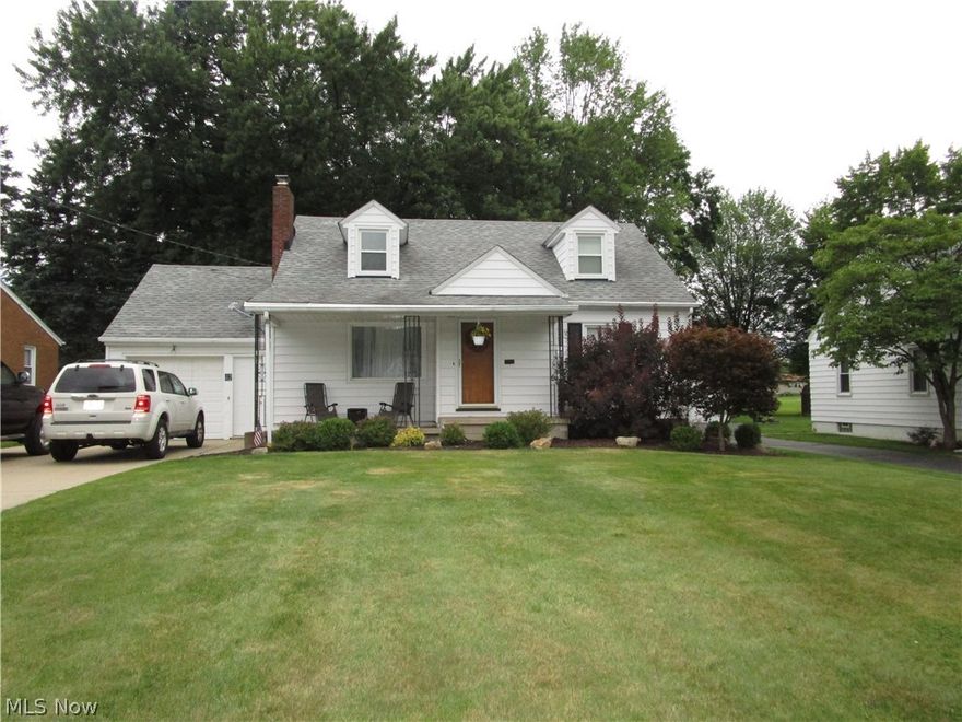 Come see this Charming Cape Cod that has so much to offer!  Spacious Living Room has a beautiful woodburning fireplace for cozy evening.  There are two large bedrooms on the first floor with an updated bath. Kitchen and Dining Area have great views of the fenced-in backyard and large cement patio area.  The 3rd bedroom is located on the 2nd floor with built-in storage/dressers and large closets. Also on the second floor, is a great area for an office, computer or sitting area.  The Basement is mostly finished and is already setup for entertaining with a family/rec room and a large bar. Hardwood Floors run throughout the house, even under carpeting. Exterior updates include newer roof and all the windows 2013/2015.  Inside newer Furnace, A/C, upgraded electric including ground wire, plumbing, hot water tank-2013, light fixtures and glass block windows. One year home warranty comes with the purchase