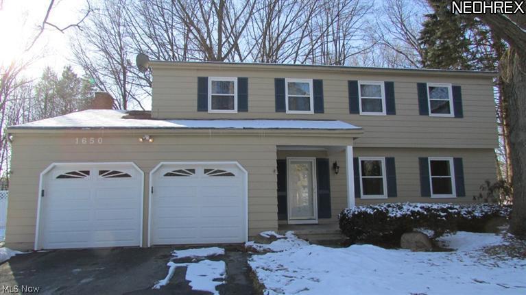 Welcome home to this secluded Colonial on a cul-de-sac. This spacious home is private, although close to the buzz of downtown Kent as well as Kent State University. Beautiful yard and lot, the home has updated appliances, new windows 2012, 4 bedroom 2.5 baths, with a master suite, attached 2 car garage and shed. Hardwood floors in bedrooms, and finished basement with additional recreation room and office. This home has an out in the country feel, with the convenience of being near all the happenings of Kent, and is less than 2 minutes to Interstate 76. This home is well cared for and a great value! Definitely worth a look! Home warranty is being offered through Old Republic as well!