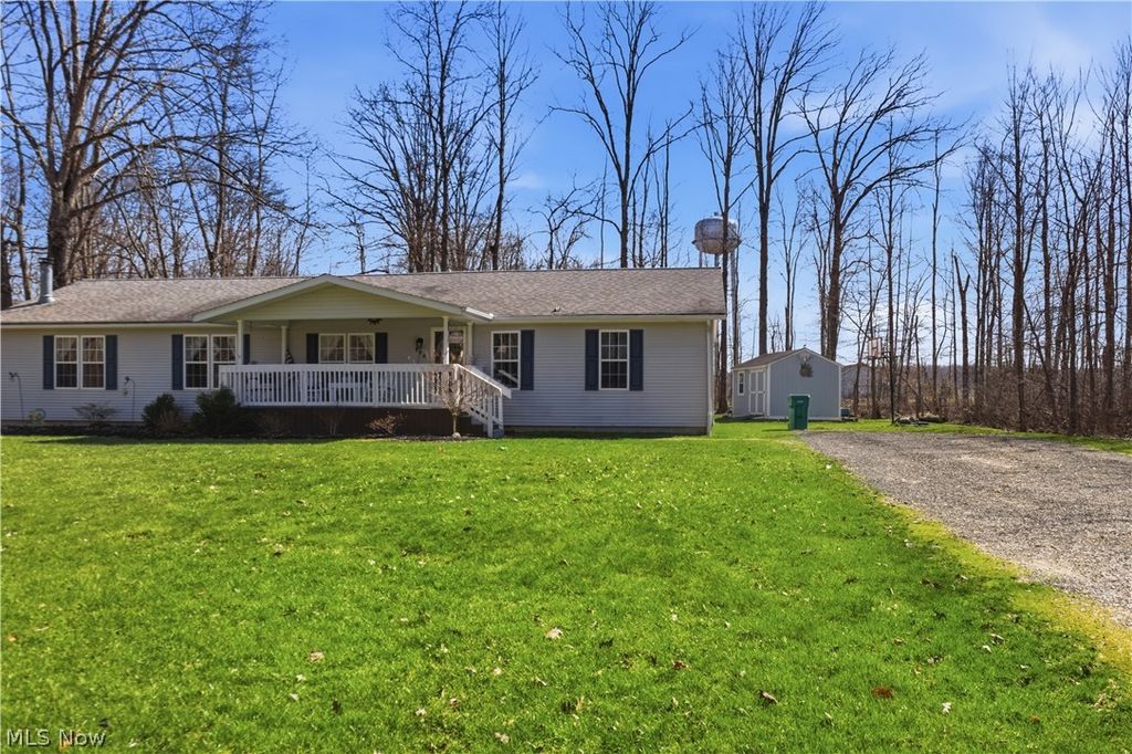 Photo of 898 Longshadow Drive, Roaming Shores, OH 44084 (MLS # 5197643)