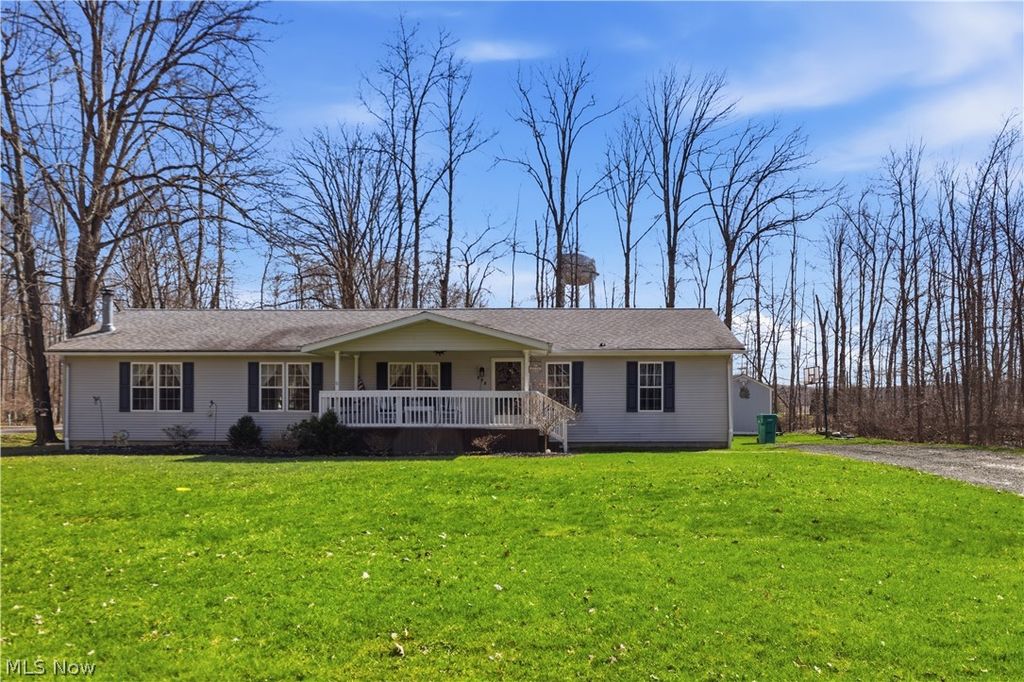 Photo of 898 Longshadow Drive, Roaming Shores, OH 44084 (MLS # 5197643)