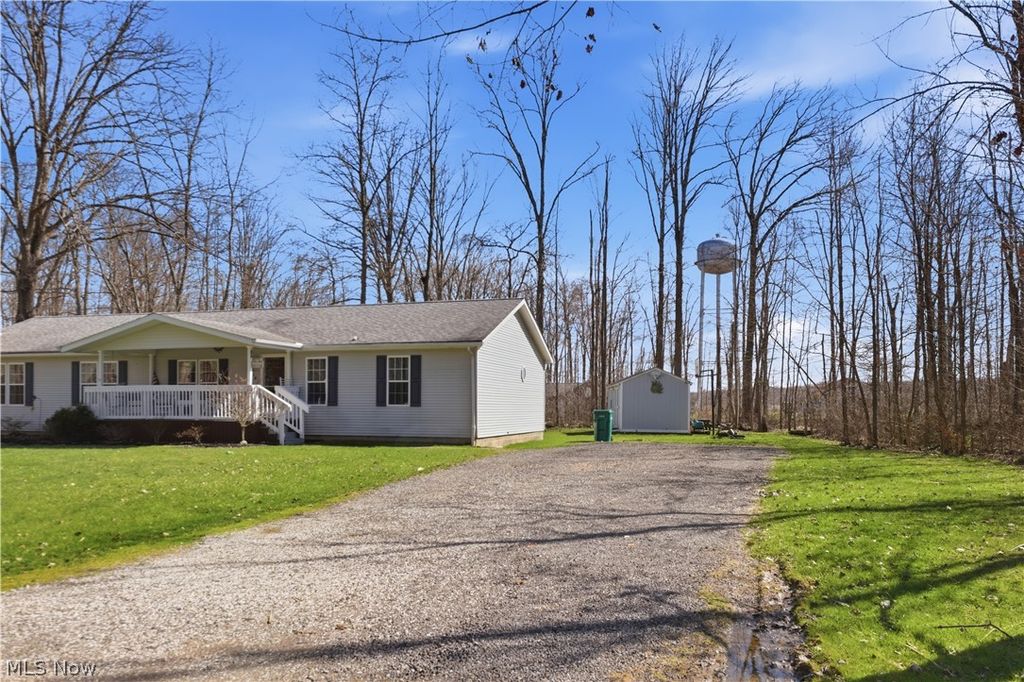 Photo of 898 Longshadow Drive, Roaming Shores, OH 44084 (MLS # 5197643)
