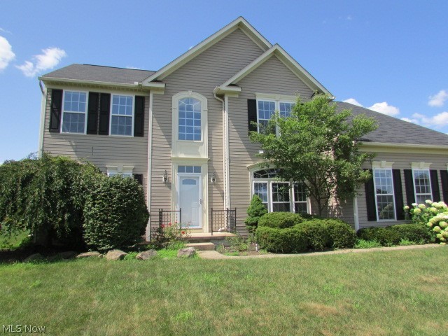 Lovely Colonial with Two Story Open Foyer, Modern staircase 9ft. ceilings, vaulted ceiling in sunny morning (breakfast room) w/tile flooring and kitchen boasting an over-sized breakfast island, tile back splash, newer stainless appliances. Open from the kitchen is the inviting Great Room with a gas fireplace and wall of windows, huge 1st floor laundry/mud room, formal living and dining rooms, w/ bayed windows, new luxury vinyl plank flooring throughout most of the first floor. Large master suite, huge walk in closet and tiled en-suite bath. Entertain on the new stamped concrete patio. Finished lower level, plus storage area! Minutes from shopping, restaurants, schools, park systems, health facilities, and expressways.