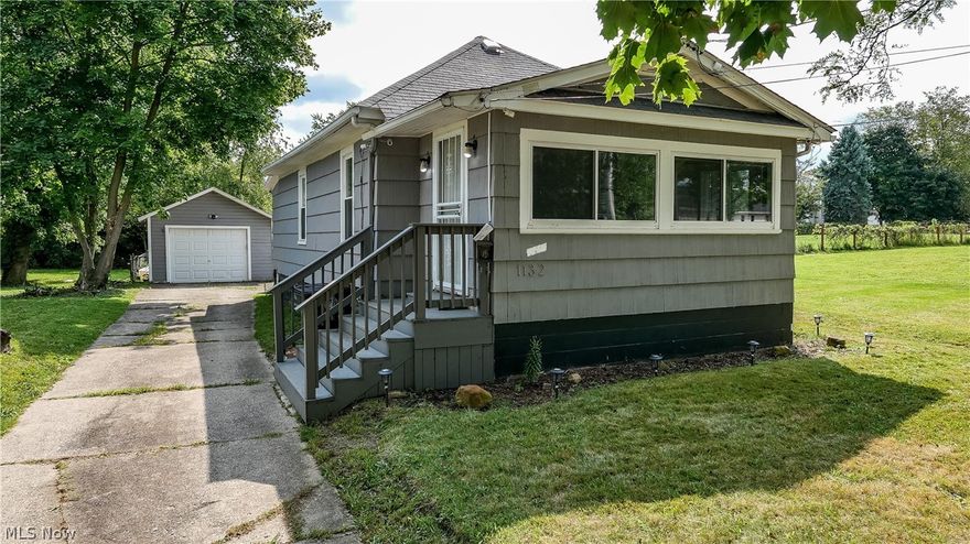 1132 Bittaker St Akron, OH 44306 is a 2 bedroom and 1 bathroom single floor Ranch home with a 1 car detached garage. Home has been completely remodeled from top to bottom in 2020 through 2022. Beautiful new and super durable and easy to clean flooring was put in throughout the home as well as LED lighting for energy efficiency & nice bright home. Central air conditioning A/C added & high efficient gas furnace as well as an electronic thermostat for precise settings. The basement was waterproofed with sump pump & foundation I-beams installed, there is a dehumidifier for extra protection. The faucets, vanity, mirror, light & tub with shower surround also replaced in 2020.  Bathroom has a multifunctional bluetooth speaker, dimming light, 2 system nightlight and bath fan system. Open floor plan with large open living, dining & kitchen area painted in neutral colors with great natural lighting as well as LED lighting, This home is great for entertaining & all the TV mounts will stay, just t