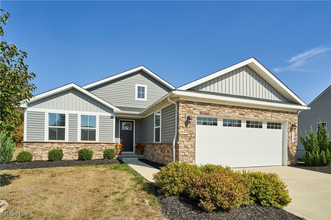 Spend this fall in your new 3 BR 2 bath 2021 build & enjoying a covered composite deck overlooking the treeline in Norton. 3649 Stradley Circle in Cider Ridge features an open plan, high ceilings and an attached 2 car garage. Pass by neat landscaping to a front porch and welcoming front foyer. Off of the foyer you'll find 2 well-sized bedrooms with ample closet space and a full bath with a single vanity, LVT flooring and tub/shower. BR 1 has sound proof windows - great for a light sleeper, work meetings, even podcasting! French doors enclose a dedicated office/library. The kitchen features white quartz counters, black wood cabinets, a suite of stainless steel appliances, a pantry, LVT flooring and dining area. Off of the dining area is a slider that leads to an awesome covered back composite deck with recessed lighting that overlooks a retention pond and has nice east-facing longviews. The 14x15 primary bedroom features private views out of the back of the home and a lovely ensuite full bath with tile flooring, a double vanity, tile shower with glass door and a large walk-in closet. Laundry room on the man level includes the new washer & dryer! The lower level is unfinished and provides tons of storage and is rough plumbed for a bathroom. Also enjoy the quiet cul-de-sac location and a nice neighborhood pavilion. HOA includes landscaping and plowing. Come check out this move-in ready home that provides stylish & convenient first floor living.