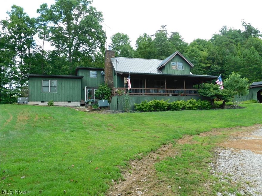 This unique home has the feel of a cottage you do not want to leave. Charming, warm, cozy, attractive, pleasant and so many other words that could explain it, but you need to see it for yourself! The sellers have made several changes of improvement since they purchased it including 40 Solar Panels, New Roof, painted the a outside Forest Green that draws you right into it. There are almost 17 acres, a pond, a barn, a shed, garage is two car and also a carport and extra storage spaces. Sitting up in a private setting with the trees nestled all around. It has the feel of your own private lodge. I was told that the home was built from timber from the property. Some floors covered with new flooring and some other remolding done as well. Open floor plan for kitchen, dining, and sitting areas. Just adorable!