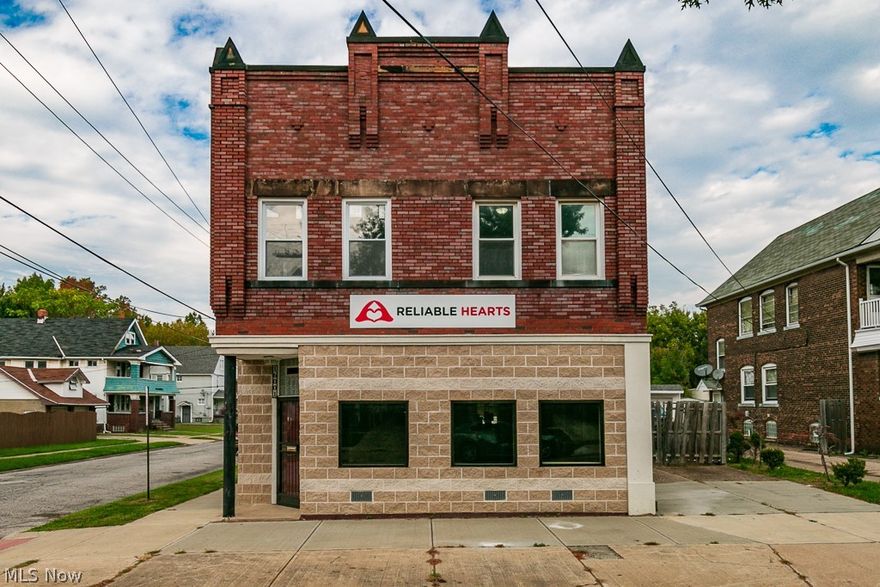 Looking for the perfect blank canvas for your business with ENDLESS possibilities? This well-maintained commercial building is located right in the heart of Cleveland, minutes from the Waterloo Art District and downtown, and close to the highway and shopping. It features three floors of open space, allowing for multiple uses. The first floor features a huge, open layout with gorgeous crown molding and hardwood floors, as well as two bathrooms and a kitchen. The second floor offers a separate, private entrance, two bathrooms and a kitchen, as well as four separate rooms that allows for countless uses, such as office space, a daycare, salon loft, or apartments. The huge basement also offers endless possibilities, and a garage is also on site. There are so many options with this unique building- it just needs the perfect owner!