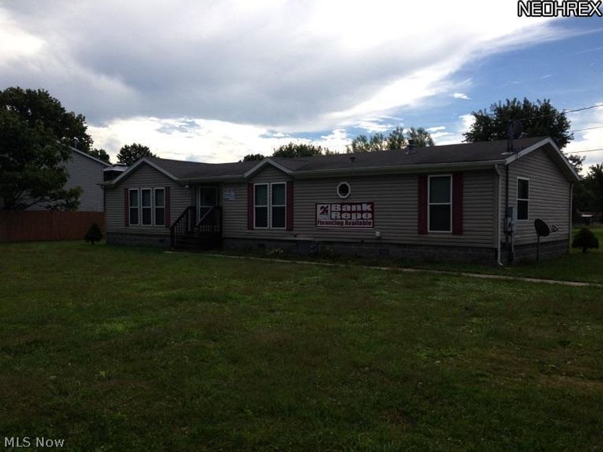 Completely updated bank owned 3 Bedroom 2 Bath home. New carpeting and paint. Big eat in Kitchen. Family room with gas fireplace. Master Suite with Garden tub in Bath. .62 Ac lot in the city limits of Alliance, city water and sewer. Large 32x24 Detached garage. Financing available.