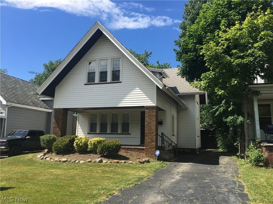 Investor Special in Cleveland Heights, priced to sell fast! This Cape Cod has a ton of Curb Appeal with a Large Front Porch, Great Layout and LOTS of potential! Fix it up to Sell or Rent, lots of Sweat Equity available here! The dining and living rooms are spacious with hardwoods in good condition and a classic fireplace. The upstairs bath was updated a few years ago and there are 3 good-sized bedrooms with wood floors and updated windows. There used to be a 1/2 bath in the basement.  The toilet was pulled and caped, but closet remains; waiting for your bathroom design to manifest. Current owners installed Central Air, all new windows, and new glass block windows in the basement in 2003. Furnace was installed in 1999. The garage can contain two cars and has space for storage (2.5).  Buyers to assume all POS Violations. The home is located close to the Cedar Lee entertainment area, trending mixed-use districts, and easily accessible to downtown Cleveland.  Call today for an appointment,