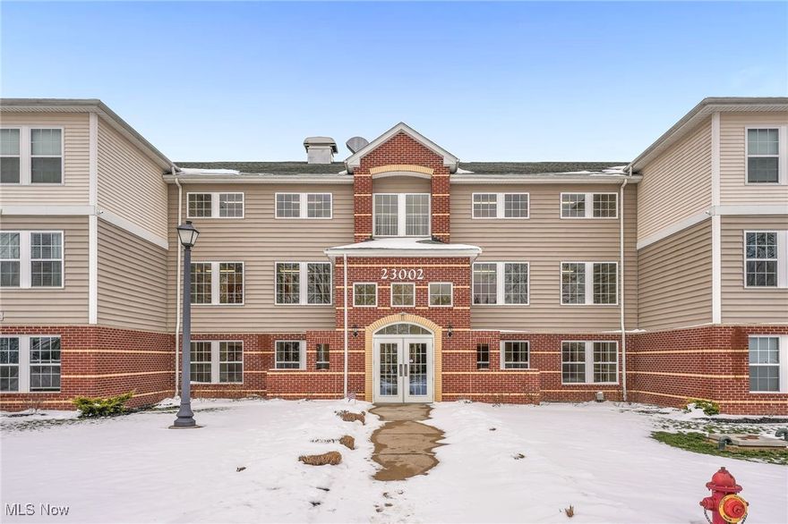 Welcome to 23002 Chandlers Lane #223 in Olmsted Falls, a beautifully maintained condominium built in 2020 that offers modern comfort, convenience, and a welcoming community setting. This 3-bedroom, 2-bath residence includes a dedicated storage area and parking garage space (#38), with all major systems and finishes still feeling fresh and current. The community itself features a peaceful pond, walking paths, and a gazebo, all while being conveniently located near major highways for easy commuting. Inside, you’re greeted by a bright and inviting kitchen positioned right at the entry, featuring bright white cabinetry, stainless steel appliances, bar seating, and space for a dining table across the way. The kitchen and dining area flow seamlessly into the cozy living room, where plush carpeting, a fireplace, and a large sliding glass patio door create a warm atmosphere filled with natural light. The living space is ideal for relaxing evenings or entertaining guests. The bedrooms are thoughtfully designed with plush carpeting and generous layouts. The spacious primary suite offers a walk-in closet and a private en-suite bathroom, while the additional bedrooms are equally cozy and versatile for guests, a home office, or additional living needs. The building’s lobby is clean and well kept, reflecting the pride of ownership throughout the community. With newer construction, convenient amenities, and a tranquil yet accessible location, 23002 Chandlers Lane #223 is a wonderful opportunity to enjoy low-maintenance living in Olmsted Falls.
