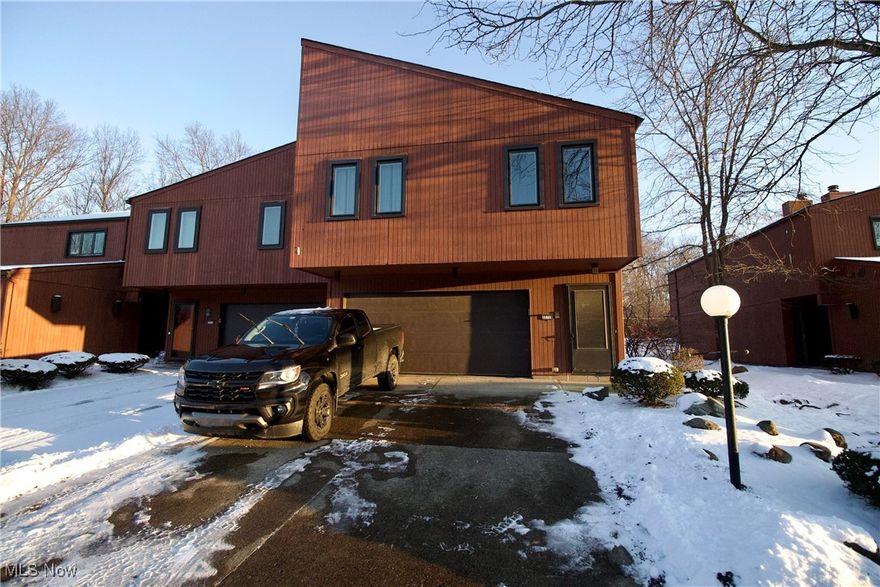 Welcome to 32715 Willow Brook Lane in North Ridgeville! This thoughtfully maintained condo offers a perfect combination of comfort, convenience, and modern updates. The main floor features an attached garage, a convenient laundry area, and an extra room that can be used as an office, den, or hobby space to suit your lifestyle needs. Upstairs, you’ll find two spacious bedrooms, including a primary suite with a walk-in closet and a private bathroom, along with a second full bathroom, making this home ideal for families or guests. The open-concept kitchen, dining, and living area provides a bright, inviting space for daily living and entertaining. Step out onto the private deck from the living area and enjoy outdoor dining, morning coffee, or relaxing evenings with friends and family. Central air and heating as one component (installed in 2022) keeps the home comfortable year-round, while the furnace installed in 2023, electric key pump (2 years ago), new filter (2023), and water tank (2018) provide peace of mind and energy efficiency. The home also features a functional wood-burning chimney, adding charm and warmth. Move-in ready with modern updates, ample storage, and a convenient North Ridgeville location, this condo offers comfort and style for its next owner.