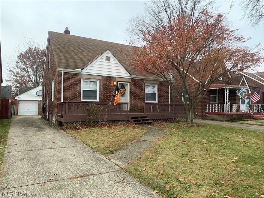 Solid Brick Bungalow/Move right in/Updated furnace & hot water heater (2012)/ Newer roof house and garage 2013/ Update electrical  panel/Glass block windows/Fenced Yard with large deck and front porch/Newer cabinets with new kitchen floor plus appliances/Recently painted/ Newer windows/ Plus Brick and block garage with pull down stairs for extra storage & insulated new garage door. Buy now rates are low!