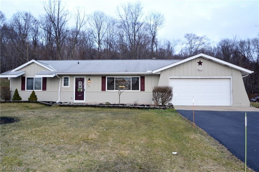 Serenity in Macedonia describes this totally updated ranch with so many newer items it will WOW you. New in the past couple years are washer, dryer, refrigerator, microwave, garbage disposal, two pantries, added extra kitchen cabinets, updated lighting fixtures, granite countertops, beautiful backsplash, sink and faucets, and new in March 2016 are the cooktop and wall oven. Both of the full baths have newer vanities and sinks. The view from the kitchen, the family room and the sunroom as well as the patio is wooded with parkland beyond. All doors and windows have been replaced in the past few years.  The two car attached garage features a heater.