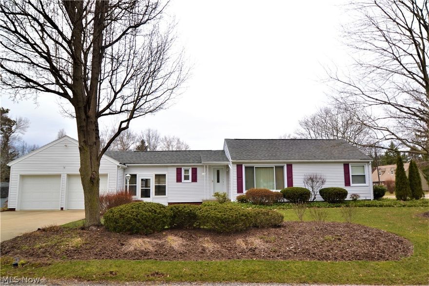 Immaculate condition inside and out with this vinyl sided ranch on lovely corner lot in North Canton. This home has been loved and cared for. Two bedrooms and full bath on the main floor, in addition to the large living room/dining room area. Fully applianced kitchen with oak cabinets and breakfast room area. The lower level recreation room is finished, and also features a third bedroom and closet, in addition to another full bathroom. Plenty of storage in the unfinished basement area which has been freshly painted. There is a breezeway (sunroom) with ceramic tile flooring connecting the garage and the home. Two car attached garage. Nature stone front porch. Rear cement patio off of sunroom. This home is in a wonderful location with easy access to everything. Put this one on your list.