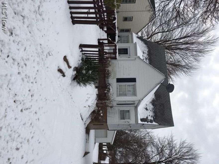 Dont miss this charming home available for rent! Great curb appeal with this 3 spacious bedroom, 1.5 bath home.  Living opens to a formal dining room.  Kitchen is spacious and open to a cozy den or additional office space.  Unlimited potential with the walk out basement and a great sized detached garage. Situated on a street of well maintained homes.  No section 8. All adult occupants must apply online for a credit criminal and eviction check.  $35 application fee.