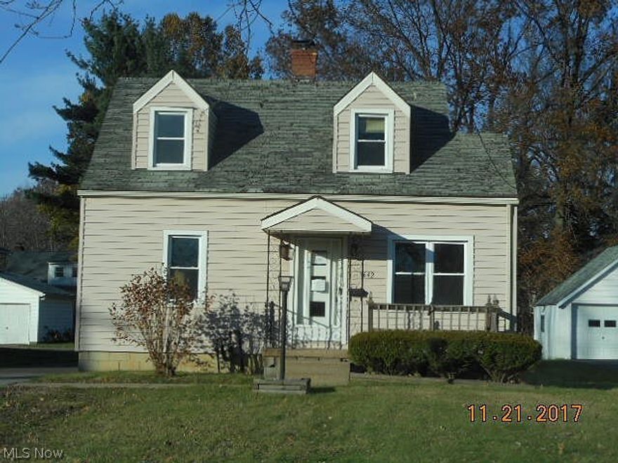 Cozy cape cod. Second floor finished into 2 bedrooms. Large enclosed back porch. Very near stores, conveniences and bus line. In need of updates. Detached garage. Sold as is.