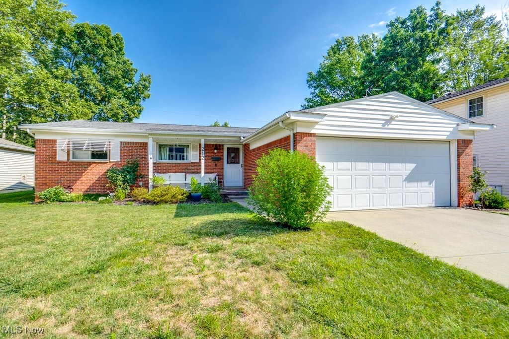 Come enjoy this beautiful ranch on a quiet street in Elyria! Step inside through the front porch and feel immediately welcomed by the hardwood floors that flow throughout the freshly painted living room that flows effortlessly into the dining room situated in front of the sliding doors that showcase a gorgeous view to the fully fenced-in backyard. The eat-in kitchen provides ample cabinet and counter space and comes equipped with newer stainless steel appliances (dishwasher was newly added in) and is adjacent to the half bathroom. The first floor is completed by 3 bedrooms and a full bathroom. Downstairs find an abundance of finished living space along with additional storage/utility space and laundry. NEW ROOF 2023! New dishwasher added 2023, new garage door opener 2023, fresh paint in living/dining room 2024.