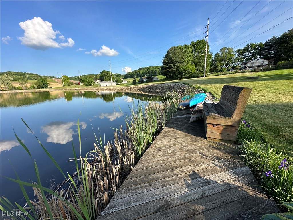 ONE-OF-A-KIND WATERFRONT RETREAT – Your dream property awaits! This rare offering 6+/- acres and features a private 4± acre stocked pond, perfect for fishing, jet skiing, or simply relaxing by the water’s edge. Preliminary approvals are in place for well and septic, along with an engineered design for a cozy 2-bedroom home or vacation getaway. Whether you’re looking to build your dream residence, create a serene escape, or launch a unique Airbnb at the Gateway to Amish Country, this property offers endless possibilities. Bring your water toys, your fishing gear, or just a good book—and soak in the unmatched beauty and tranquility of this extraordinary setting.