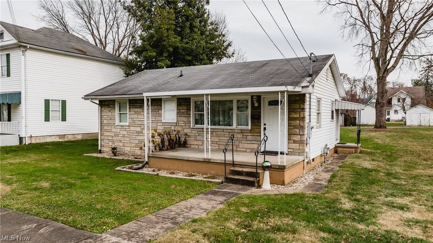 Renovated two-bedroom, one-bath gem featuring first-floor laundry for ultimate convenience. This home boasts a large lot with electric-equipped carport and alley access, providing both functionality and accessibility. Explore the potential of the partial unfinished basement, adding versatility to this inviting property.
