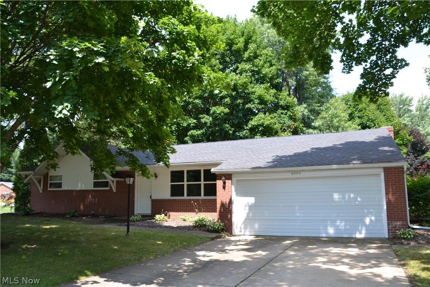All Brick Ranch On Large 1/2 Acre Corner Lot!  Three Bedrooms, Two and One-Half Baths.  Large Eat-In Kitchen with Under-Cabinet Lighting, Bead Board Cabinets and Pantry.  Master Bedroom Includes Private Half-Bath and Double-Closet.  Wood Floors in Living Room and Bedrooms.  Two Car Attached Garage.  Newer Windows and Doors!  Family Room with Fireplace and French Doors to Back Yard Patio.  Fresh Paint!  Updated Full Bath on First Floor with New Tub Surround, Pedestal Sink and Flooring.  Newer Lower Level Bathroom with Shower and Exercise Area.  Water Heater Replaced in 2015.  Roof Shingles Replaced in 2012.  WiFi Thermostat.  Huge 12 x 16 Shed for All of the Toys and Yard Equipment.  Shows Great!  Clean!